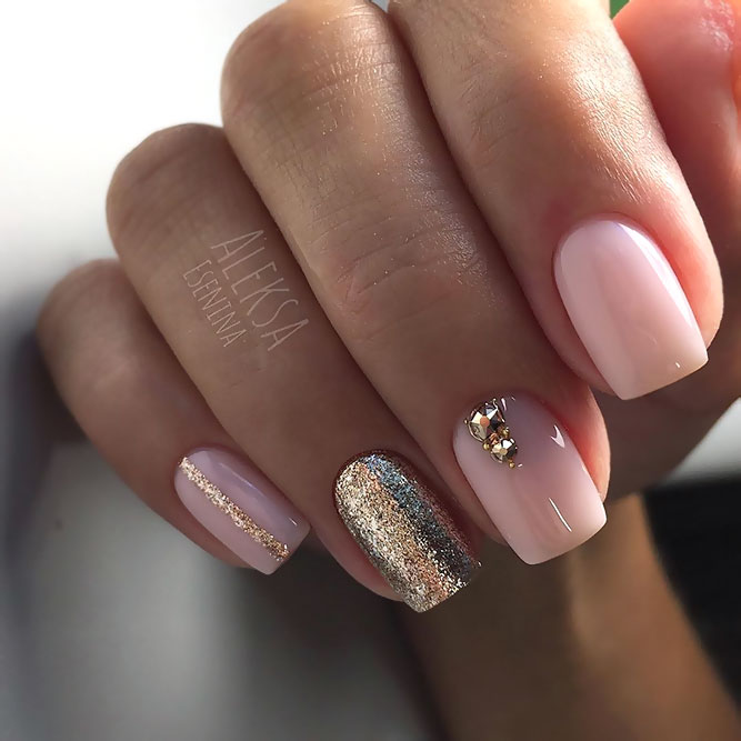light pink and gold nails