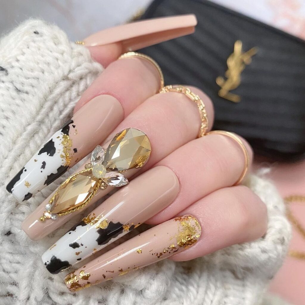 19-Cow and Gold Rhinestone Nails