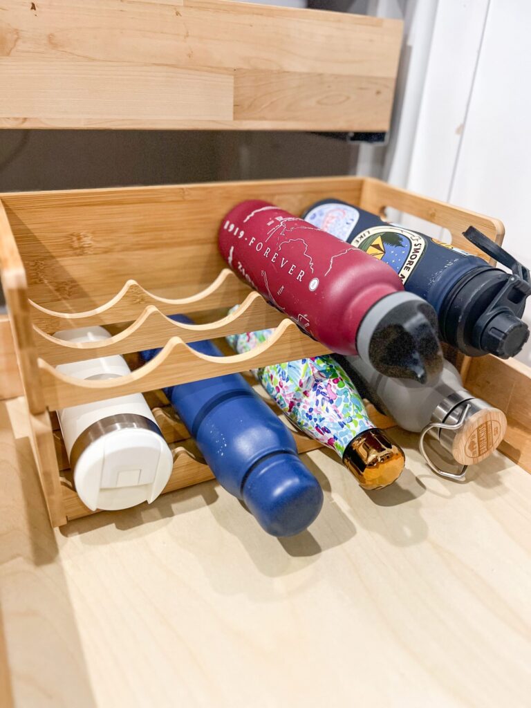 Water-bottles-on-bamboo-holder-drawer-organiziation